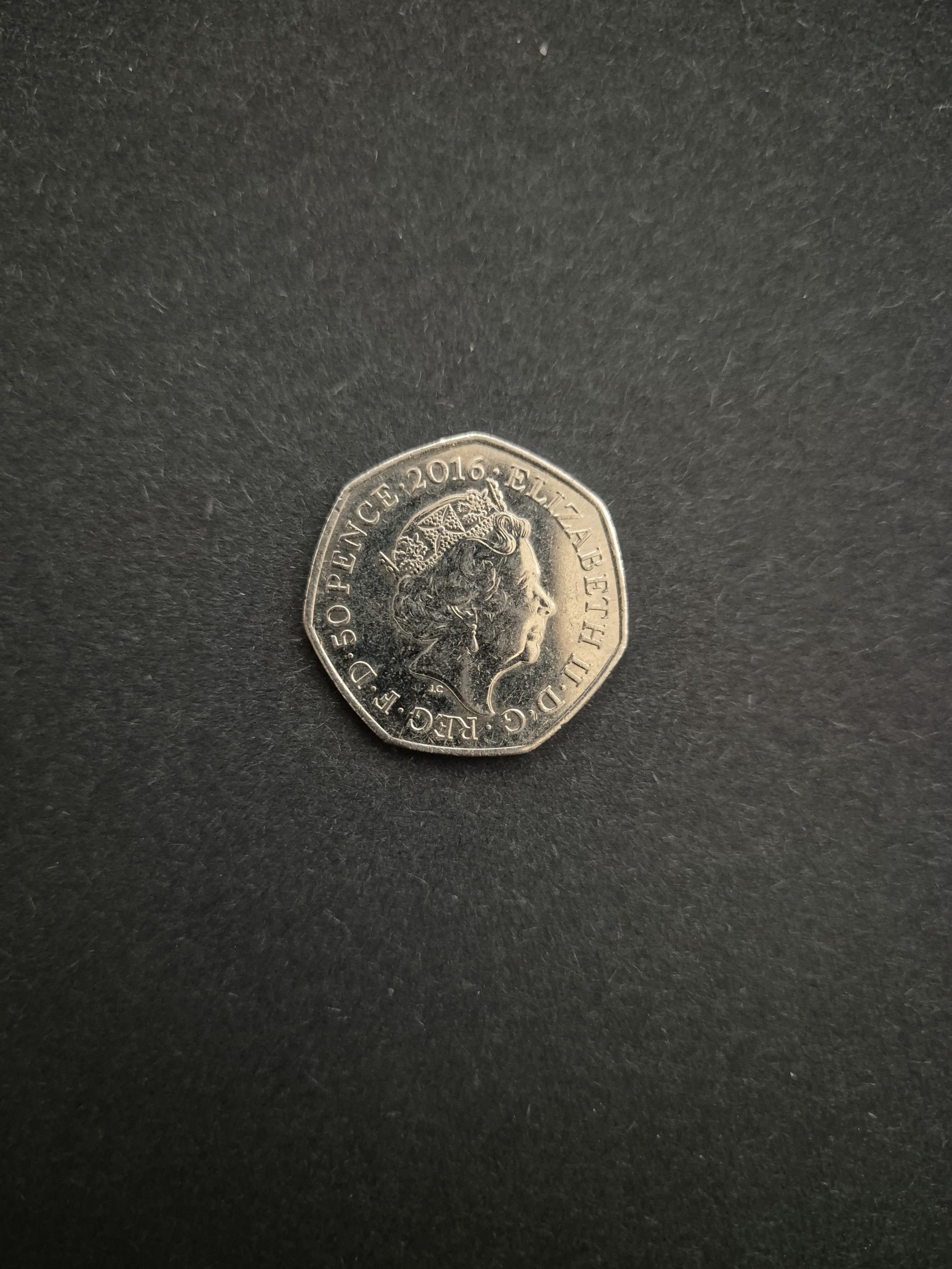2016 Team GB 50p Olympic Coin - Commemorative British Coin for Collectors Image of a 2016 Team GB 50 pence coin featuring Queen Elizabeth II's profile on one side.