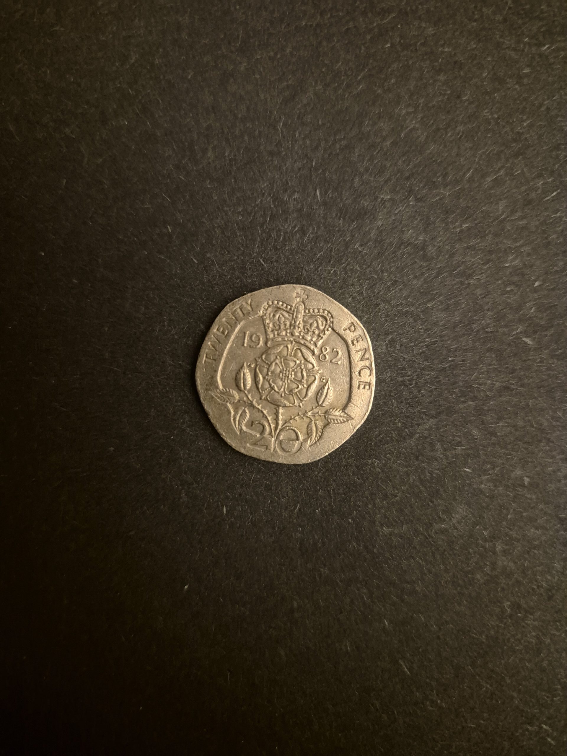 1982 20p Coin - British Coin Collector's Item Close-up of a 1982 British 20 pence coin featuring a crowned rose design.