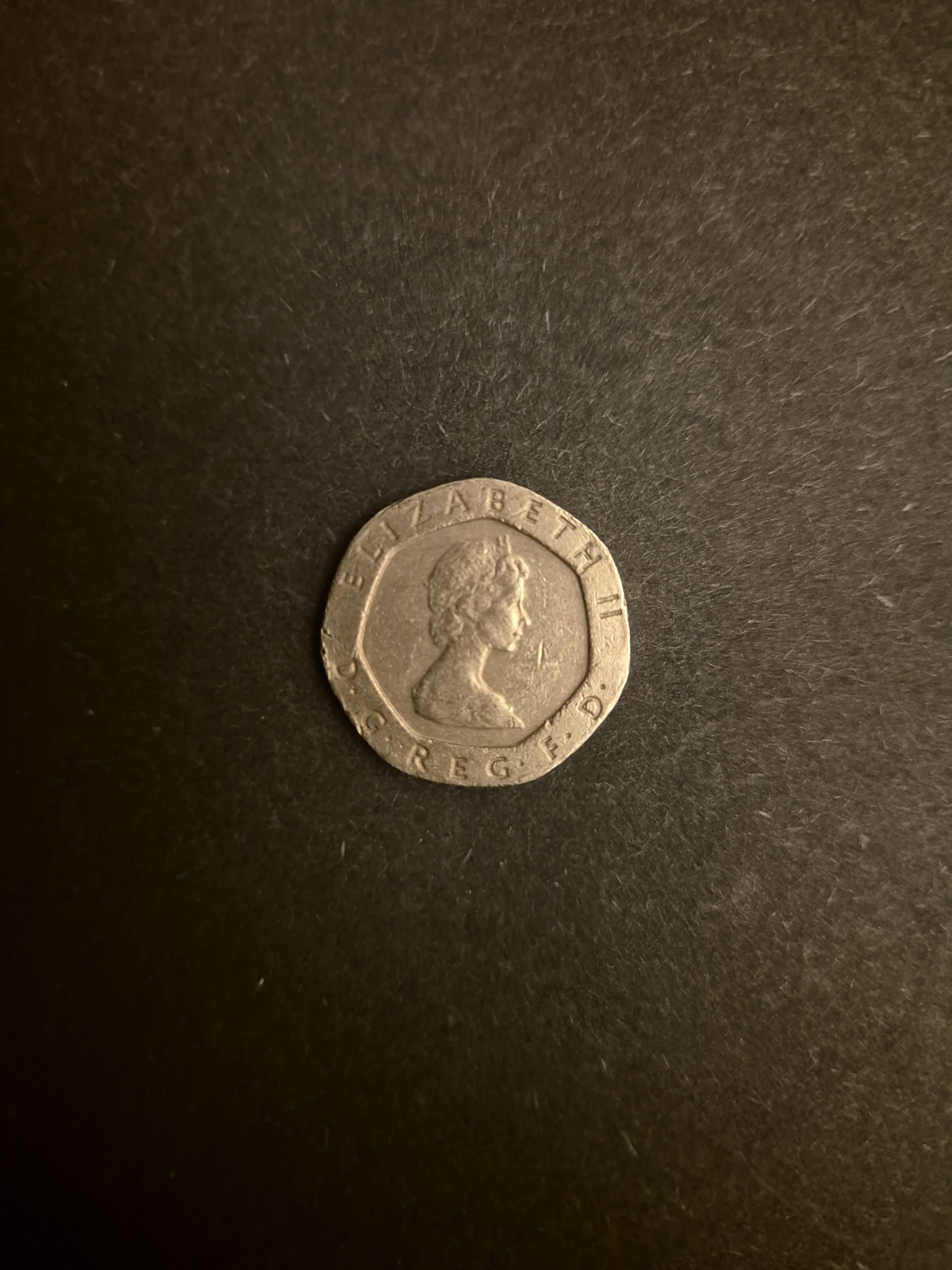 1982 20p Coin - British Coin Collector's Item Close-up image of a 1982 British 20 pence coin featuring Queen Elizabeth II's profile.
