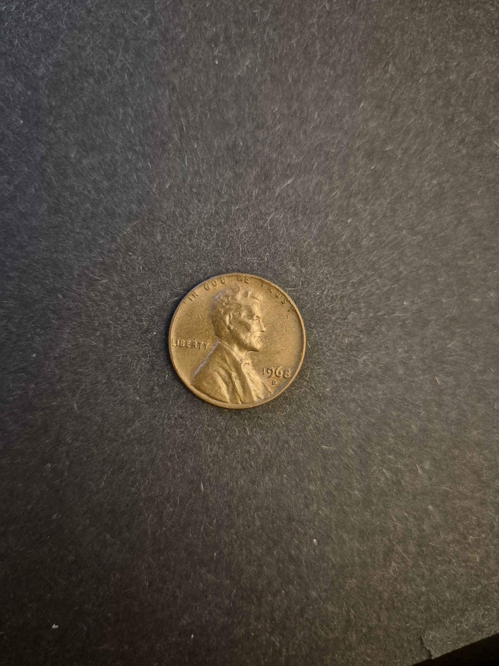 1968-D Lincoln Wheat Penny: Denver Mint Collectible US Coin Close-up of a 1968-D Lincoln Wheat Penny from the Denver Mint, showcasing the coin's details and condition.